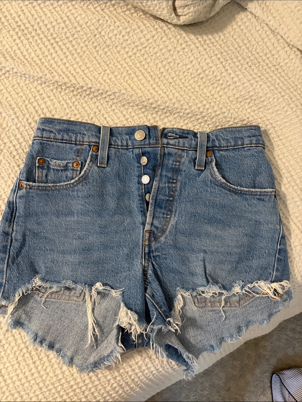 Levi's Medium Blue Frayed Hem Button-Fly Denim Shorts